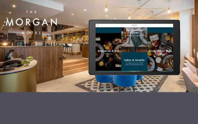 The Morgan Hotel in-room tablet mock up against their lobby image with their logo